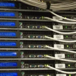 Close-up of data center server rack ports and cables