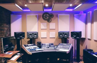 A recording studio console and digital audio workstation representing music datasets used in AI training
