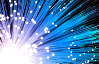 Blue-lit fiber optic cable representing high-speed data center networking