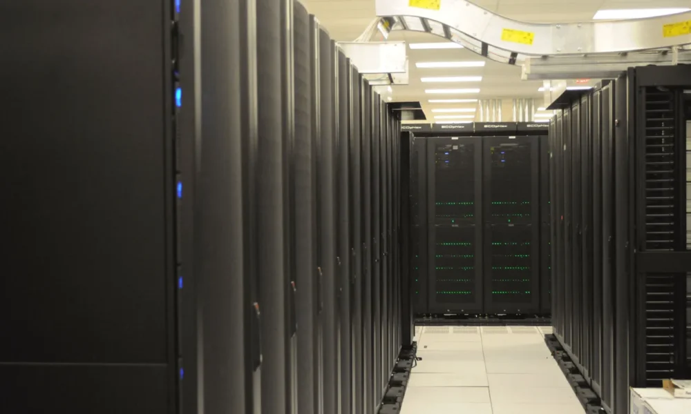 Rows of server racks in a data center representing network infrastructure targeted by botnets