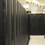 C0XMO Botnet Shows Why Old Router Firmware Still Matters Rows of server racks in a data center representing network infrastructure targeted by botnets