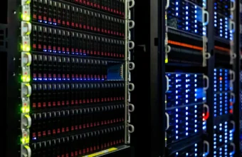 Rows of illuminated server racks in a computer room