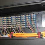 Rear view of fiber network patching in a data center rack