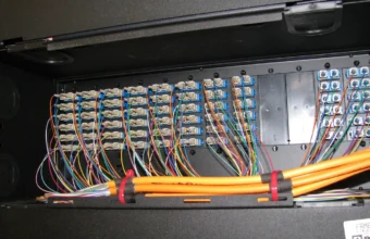 Rear view of fiber network patching in a data center rack