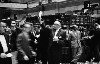 Stock exchange traders working on a busy trading floor