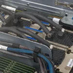 Four NVIDIA H100 GPUs in a TSUBAME 4.0 compute node representing high-bandwidth-memory AI inference capacity