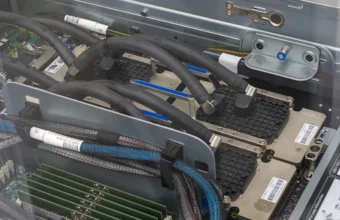Four NVIDIA H100 GPUs in a TSUBAME 4.0 compute node representing high-bandwidth-memory AI inference capacity