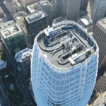 Salesforce Tower roofline photographed from below, representing CRM integrations in the Klue breach