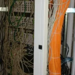 Network and server rack representing Linux hosting environments where shell environment variables are used