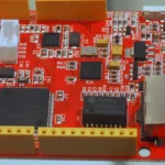 Microcontroller development board photographed at Embedded World, representing MCU fleet management