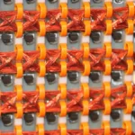 Close-up of a 16Kb rope core memory board used as a visual metaphor for structured AI agent memory