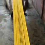 Threads stretched across a traditional loom, representing the enterprise open source software fabric