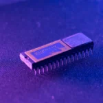 Close-up of BIOS firmware chips representing Secure Boot trust anchors and firmware inventory