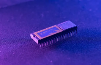 Close-up of BIOS firmware chips representing Secure Boot trust anchors and firmware inventory