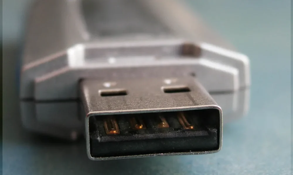 Close-up of a USB flash drive, representing physical data-theft risk in office security incidents