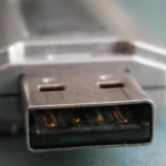 Close-up of a USB flash drive, representing physical data-theft risk in office security incidents