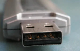 Close-up of a USB flash drive, representing physical data-theft risk in office security incidents