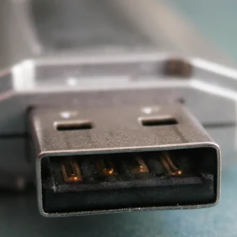 Close-up of a USB flash drive, representing physical data-theft risk in office security incidents