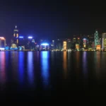 Hong Kong financial district skyline at night over Victoria Harbour