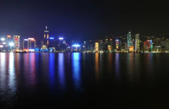 Hong Kong financial district skyline at night over Victoria Harbour