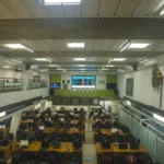 Stock exchange trading floor viewed from above as OpenAI prepares confidential IPO paperwork
