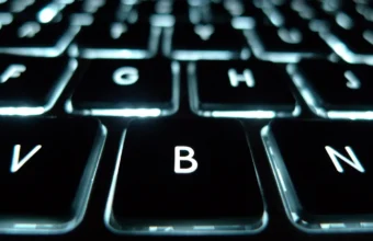 Backlit keyboard close-up representing SSH keys and remote server access