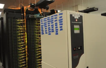 Server rack network cabling representing host firewall policy for Ubuntu and Debian cloud servers
