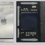 Apple M1 chip package next to its exposed silicon die on a circuit board