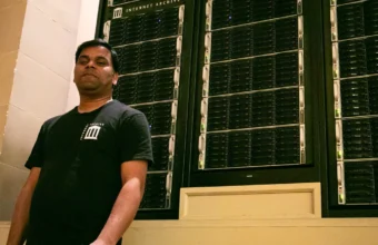 Internet Archive Great Room with servers in the background, representing web content infrastructure under pressure from AI crawlers