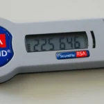 RSA SecurID hardware authentication token displaying a rotating six-digit code