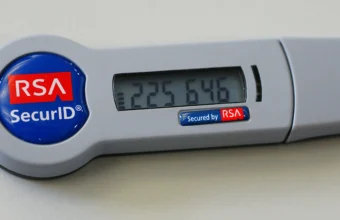RSA SecurID hardware authentication token displaying a rotating six-digit code