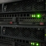 Rack of NVIDIA Tesla GPU computing nodes interconnected by cabling in a datacenter