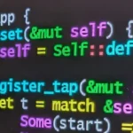 Rust source code with syntax highlighting displayed on a laptop screen
