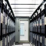 Rows of server racks inside CERN's computer center, the kind of physical infrastructure that hypervisor-based pod isolation like Kata Containers runs on