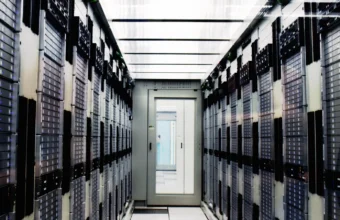 Rows of server racks inside CERN's computer center, the kind of physical infrastructure that hypervisor-based pod isolation like Kata Containers runs on
