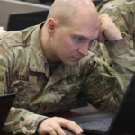 Arkansas Army National Guard Chief Warrant Officer 2 Robert Ellison competes in a Capture the Flag cybersecurity exercise during Cyber Shield 2026