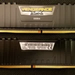 Two Corsair DDR4 RAM memory modules on a black background