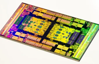 Colorful macro photograph of an AMD EPYC server processors silicon die on a white background