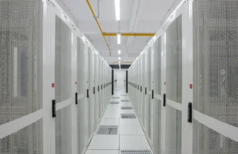 Rows of white server racks in a data center corridor, illustrative of the rack-scale infrastructure behind Nvidia's Vera Rubin platform