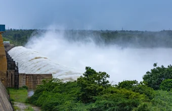 Floodwater rushes through an open spillway gate at the Narayanpur Dam on the Krishna River in Karnataka, India