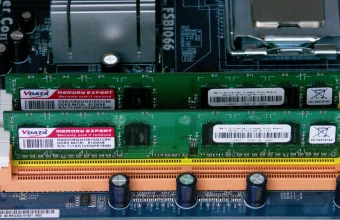 Close-up of two RAM memory modules installed in a desktop computer motherboard