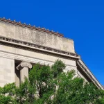 The Robert F. Kennedy Department of Justice Building in Washington, D.C., showing its carved inscription and the Department of Justice seal