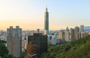 Taipei 101 skyscraper rising above the Taipei skyline at sunset, representing Taiwanese chipmaker MediaTek