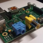 Close-up photo of a Raspberry Pi single-board computer, representing the kind of small edge hardware that compact AI models like LFM2.5-2.6B are designed to run on