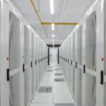 A row of enterprise server racks in a modern data center aisle