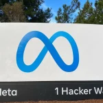 Meta headquarters entrance sign reading 1 Hacker Way with the Meta logo, in Menlo Park, California
