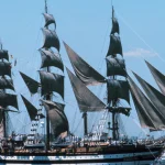The Italian tall ship Amerigo Vespucci under full sail, sails filled with wind