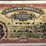 A counterfeit 1922 Banco de Portugal 500 escudo banknote, hole-punched and stamped Duplicado, on display at the British Museum