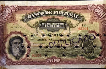 A counterfeit 1922 Banco de Portugal 500 escudo banknote, hole-punched and stamped Duplicado, on display at the British Museum