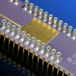 Italy’s Exein Raises $270 Million to Build a Foundation Model for Physical AI Security Macro photo of a ceramic microcontroller chip with an exposed gold die, representing embedded device security